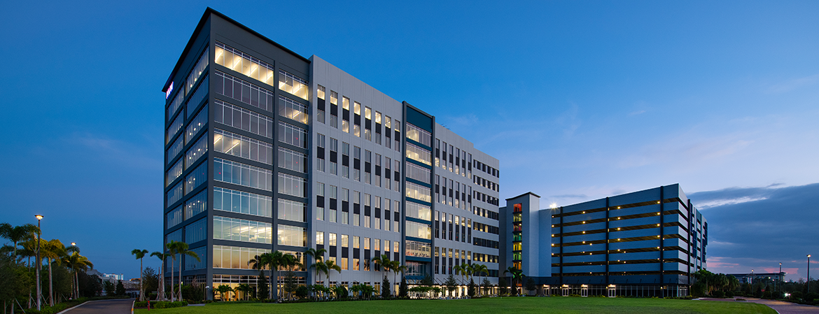 Wide shot of City Center parking garage and office building