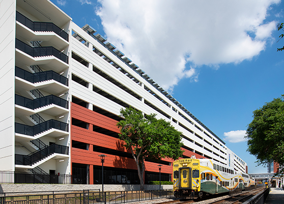 McRae Ave Garage with Sunrail Passing By