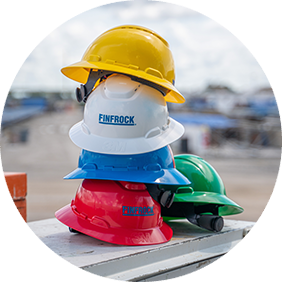 FINFROCK hard hats are gathered in various colors