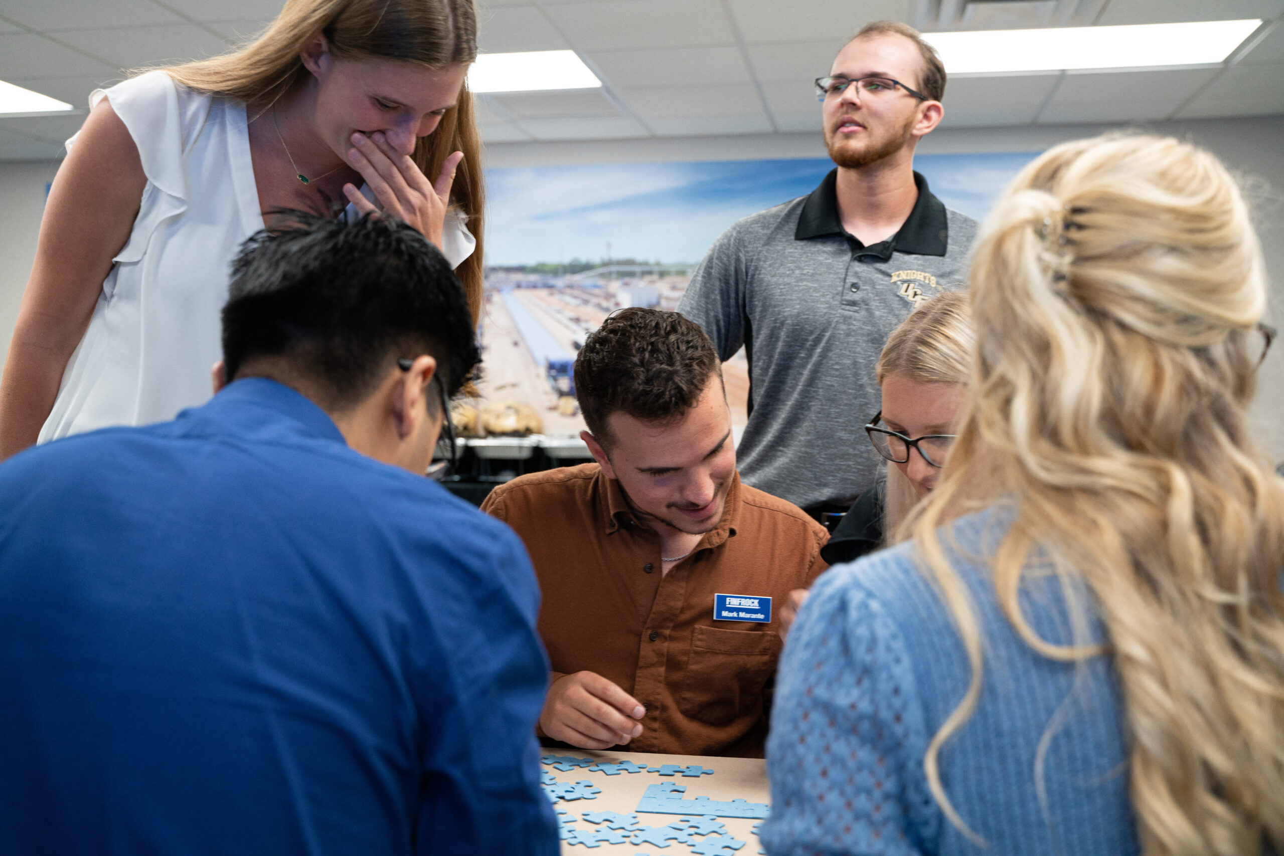 Some of our finterns and digital strategist solving a puzzle