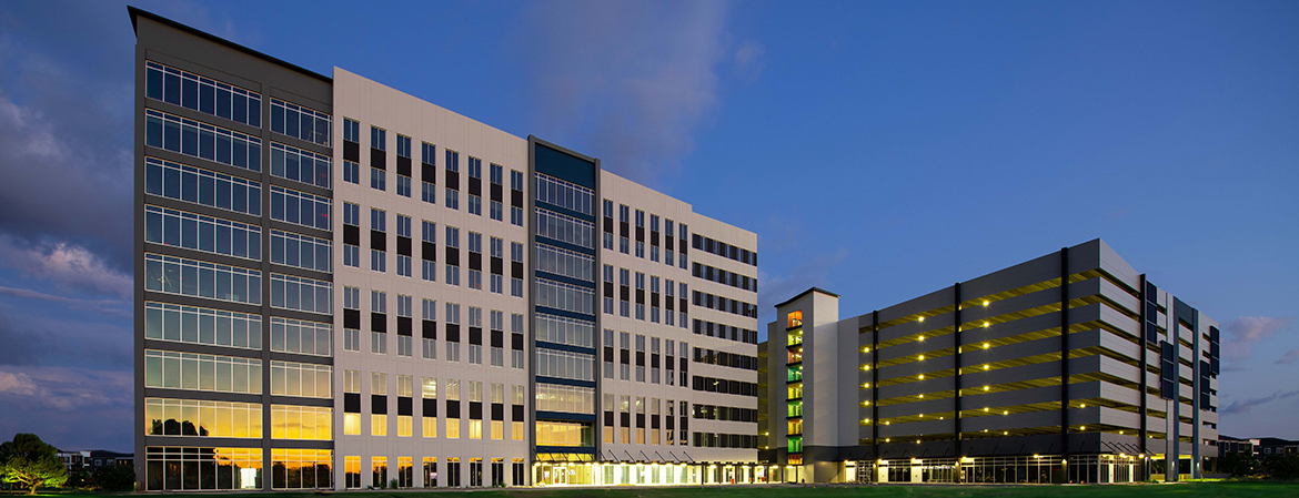 Wide shot of City Center parking garage and office building