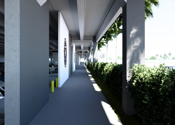 Covered Pedestrian Walkway Along Parking Garage With Columns And Landscaping